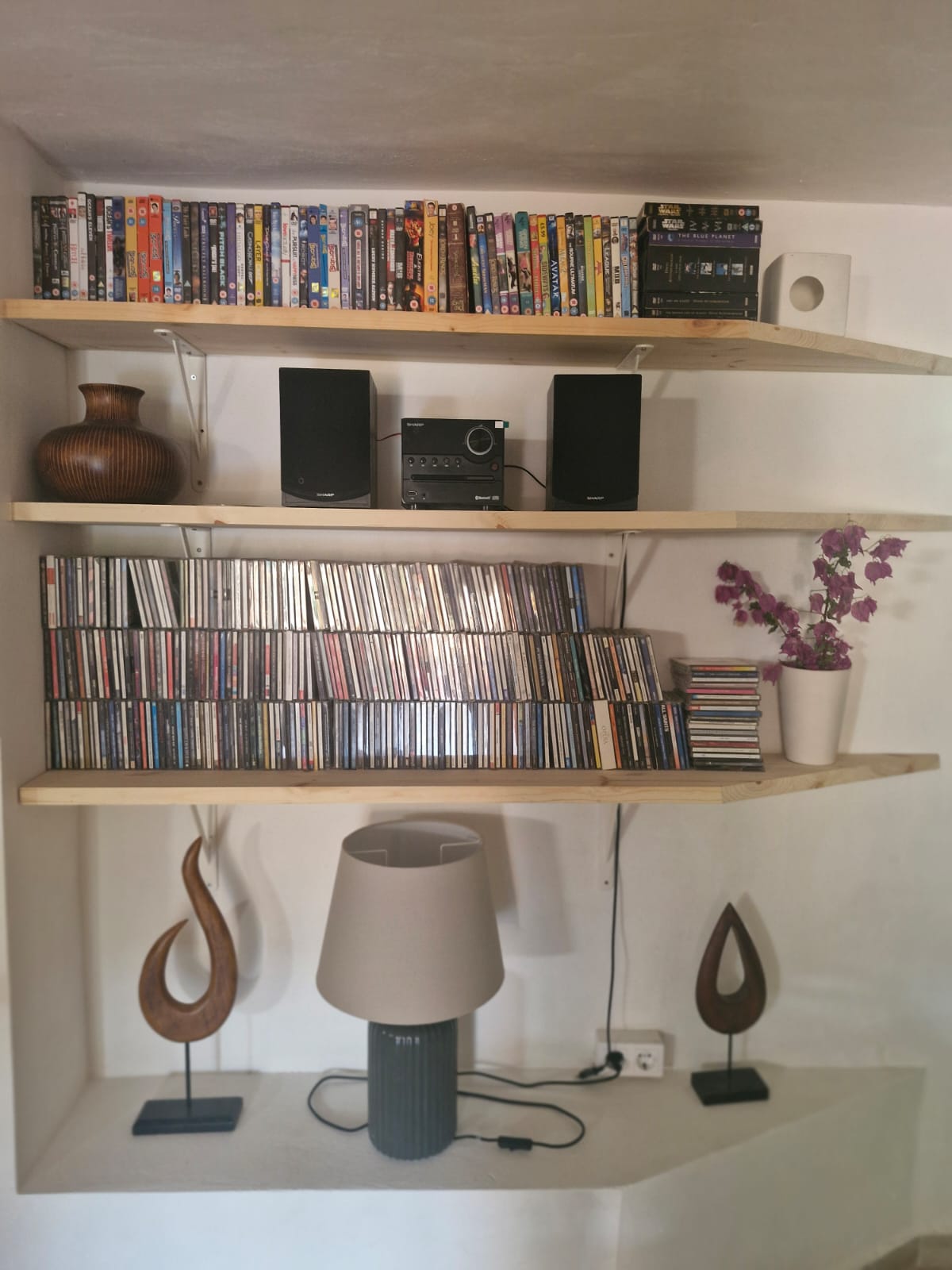 Entertainment shelves with DVDs and stereo